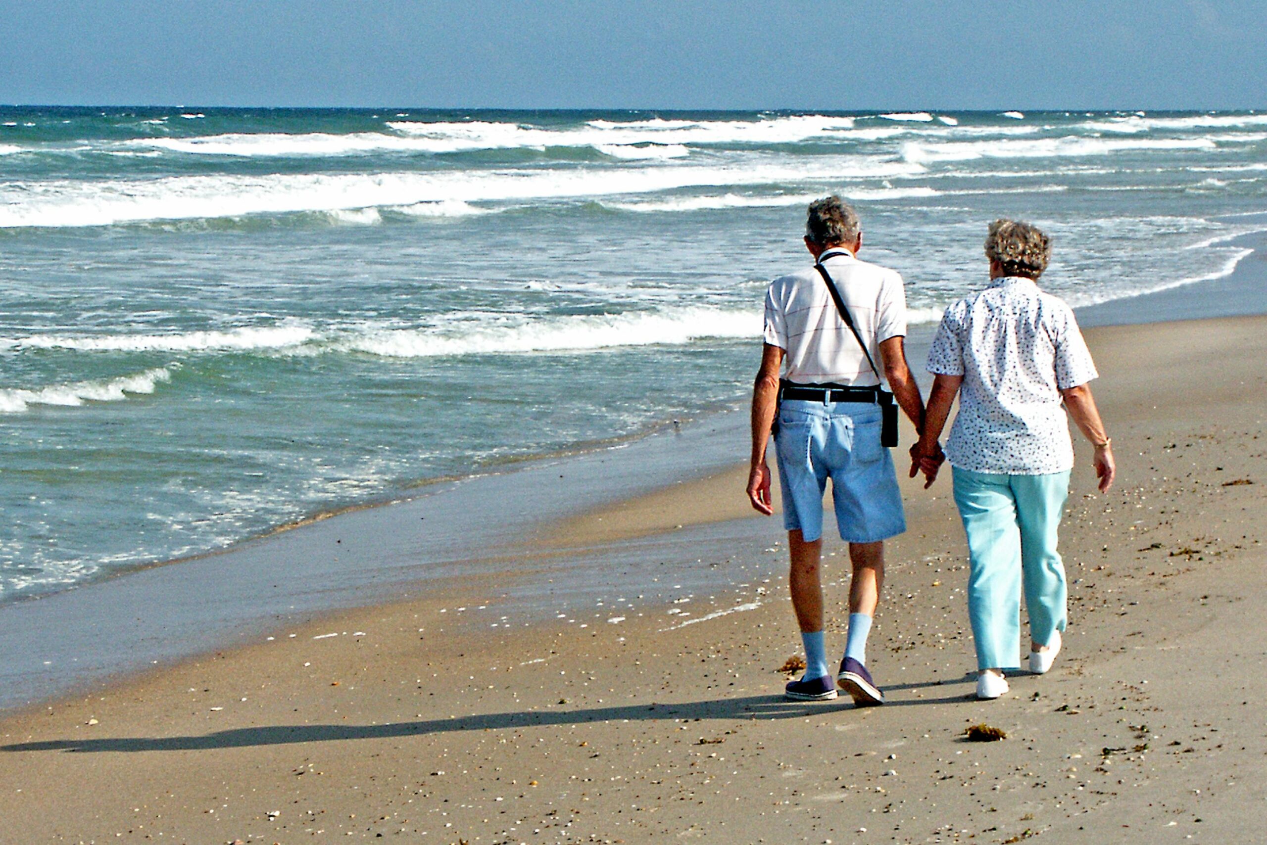 elderly beach walk